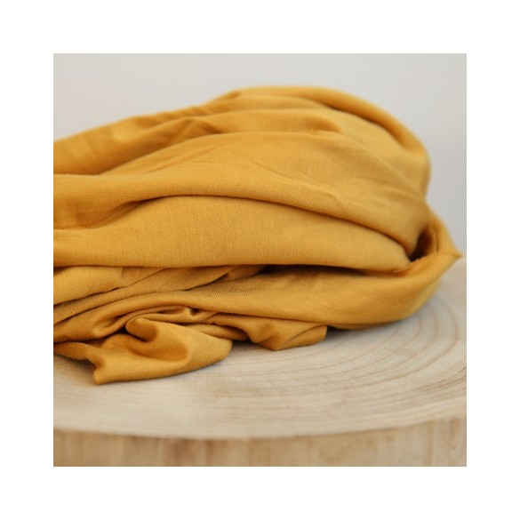 tissu bambou ocre - un chat sur un fil