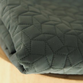 tissu matelassé vert foncé et noir