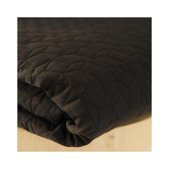 tissu matelassé noir - un chat sur un fil