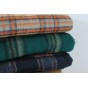 collection de lainage type plaid - un chat sur un fil