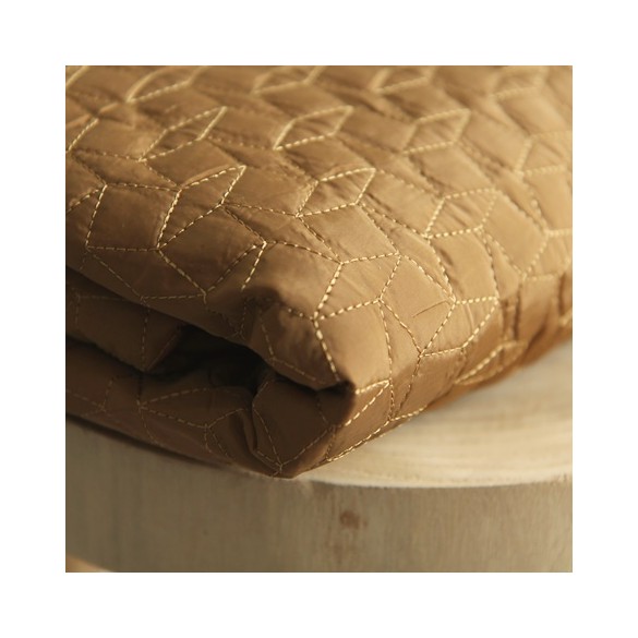 tissu matelassé ocre et noir
