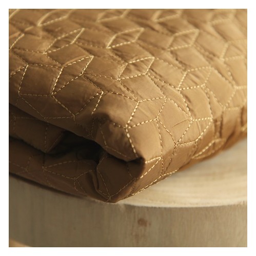 tissu matelassé ocre et noir tissu matelassé ocre et noir