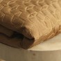 tissu matelassé ocre et noir