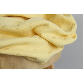 gaze de coton jaune et doré