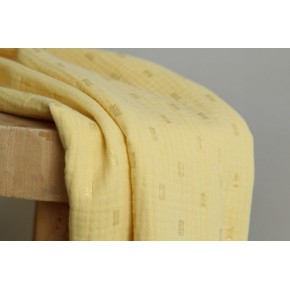 tissu double gaze jaune motif doré