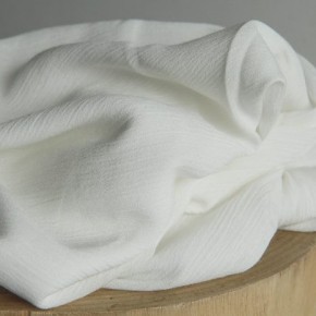 crépon blanc cassé - un chat sur un fil