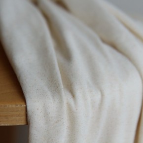 tissu jersey écru et cuivré