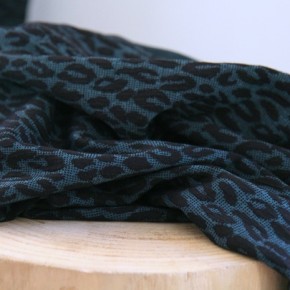 tissu maille léopard vert et noir - un chat sur un fil