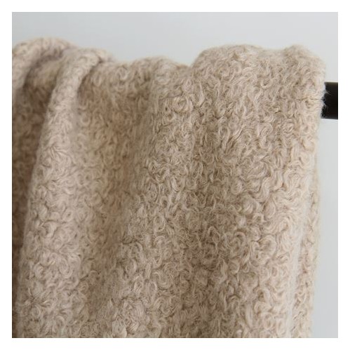 bouclette beige - un chat sur un fil