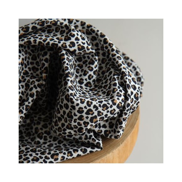 velours imprimé léopard - un chat sur un fil