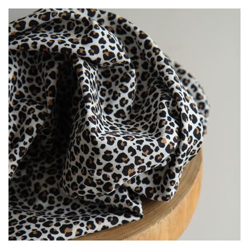 velours imprimé léopard - un chat sur un fil