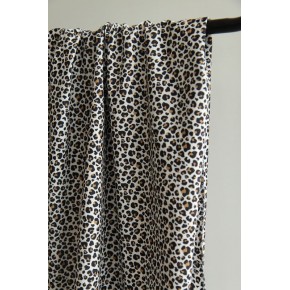 tissu velours léopard - un chat sur un fil