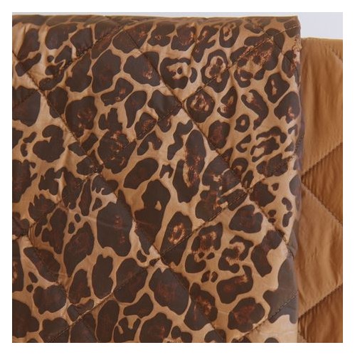 tissu matelassé léopard - un chat sur un fil