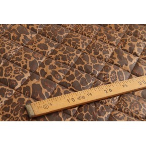 tissu matelassé léopard - un chat sur un fil