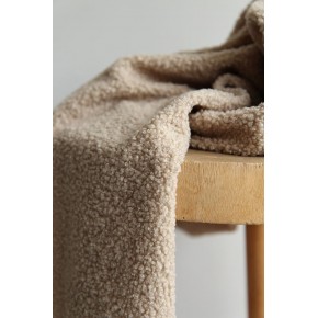 sherpa beige - un chat sur un fil