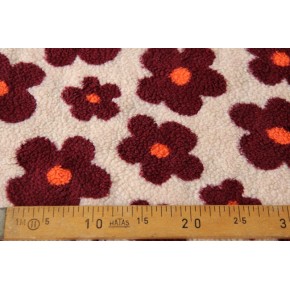 teddy sherpa fleurs - un chat sur un fil