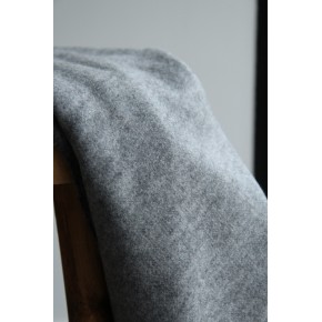 tissu en laine gris - un chat sur un fil