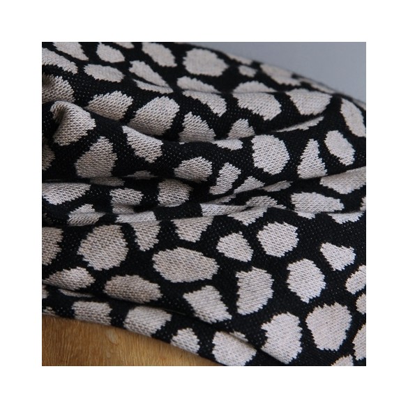 tissu en maille jersey léopard noir et beige