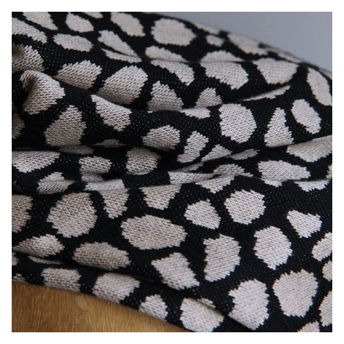 tissu en maille jersey léopard noir et beige