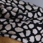 tissu en maille jersey léopard noir et beige