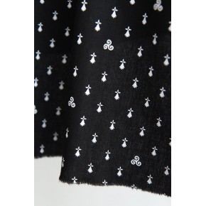 joli tissu breton fond noir - un chat sur un fil