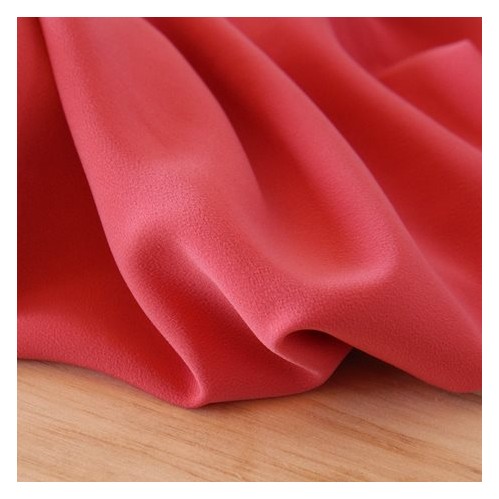 crêpe rose corail - un chat sur un fil