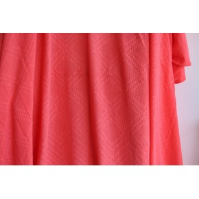 Maille ajourée losange corail