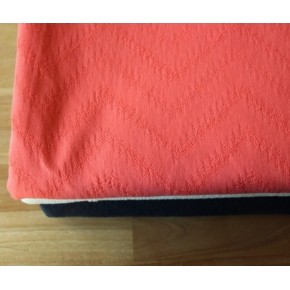 Maille ajourée losange corail - un chat sur un fil