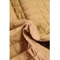 tissu matelassé beige - un chat sur un fil